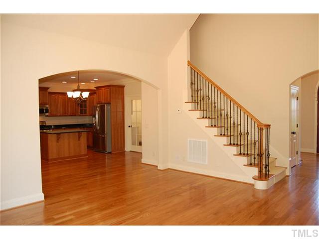 294 High Ridge Lane Pittsboro, NC 27312 - Photo 4 of 11 a view of entryway and hall with wooden floor
