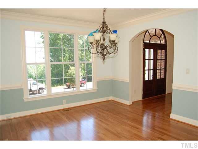 294 High Ridge Lane Pittsboro, NC 27312 - Photo 6 of 11 a view of an empty room with wooden floor and a window