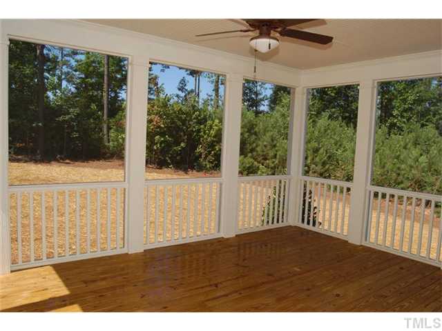 294 High Ridge Lane Pittsboro, NC 27312 - Photo 7 of 11 a bedroom with a bed and a large window