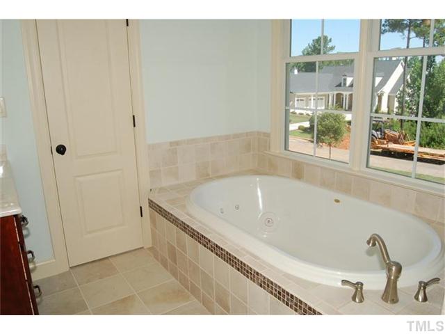 294 High Ridge Lane Pittsboro, NC 27312 - Photo 9 of 11 a bathroom with a tub and shower