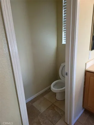 a bathroom with a toilet and a sink