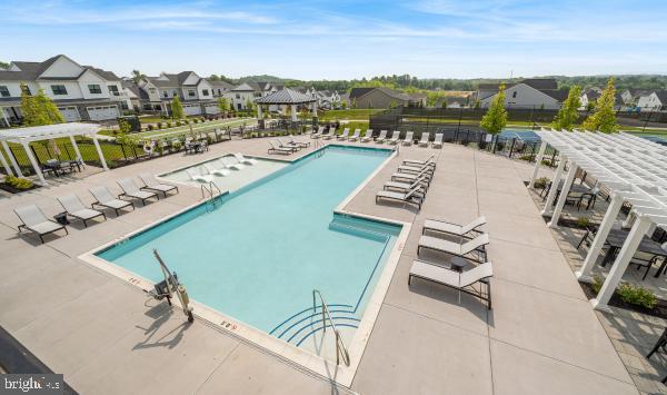 526 Trifecta Road, Unit 284 Downingtown, PA 19335 - Photo 16 of 24 a view of a city with lawn chairs