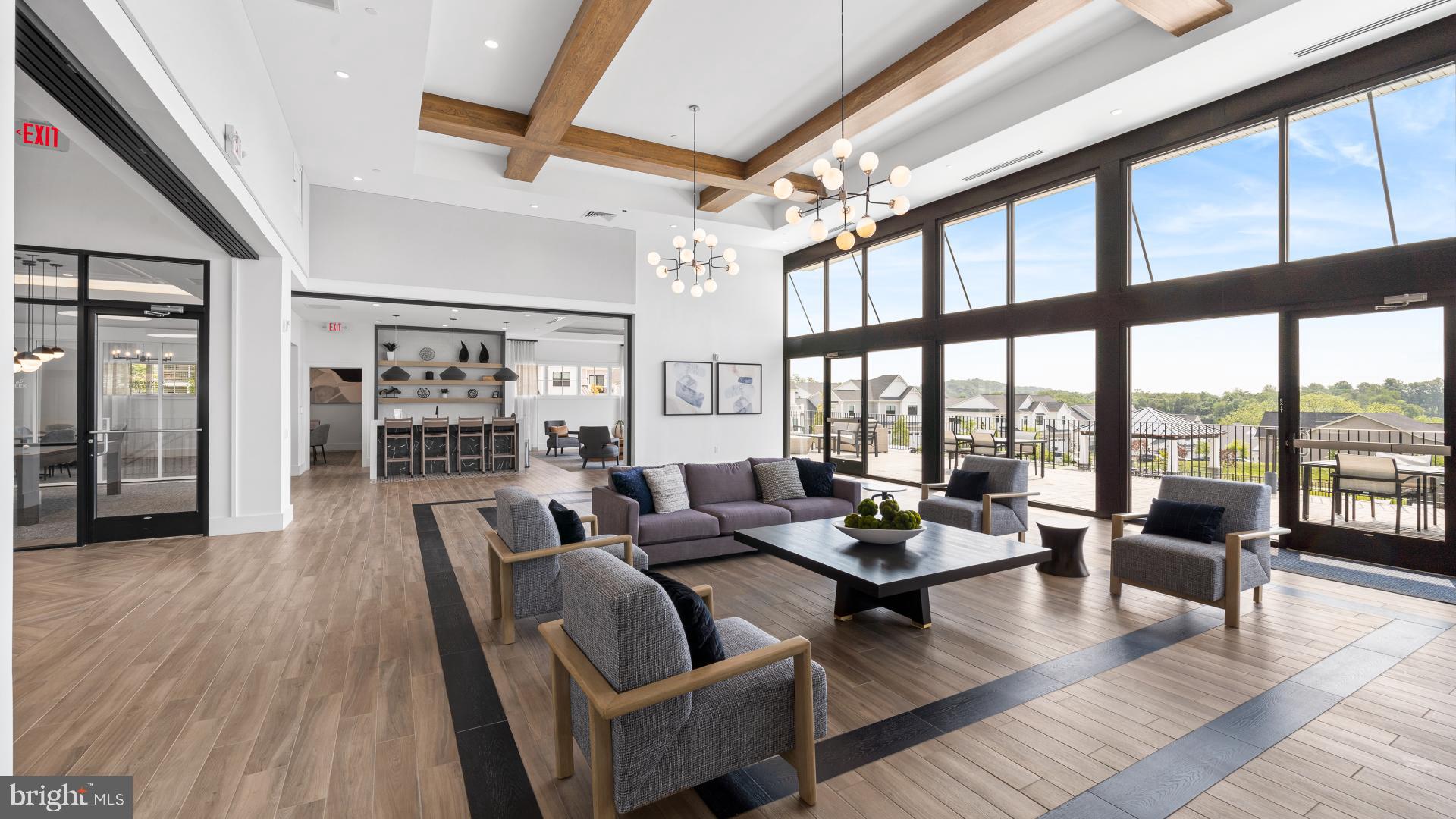 526 Trifecta Road, Unit 284 Downingtown, PA 19335 - Photo 21 of 24 a living room with furniture and floor to ceiling windows