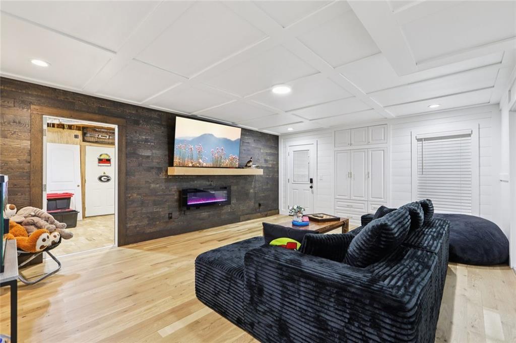 640 Ivy Lea Drive Southeast Lawrenceville, GA 30045 - Photo 44 of 79 a bed room with furniture and a fireplace