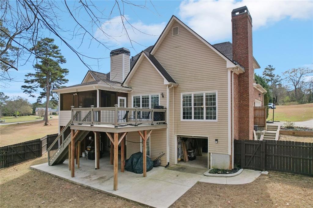 640 Ivy Lea Drive Southeast Lawrenceville, GA 30045 - Photo 73 of 79 a view of a house with a yard and balcony