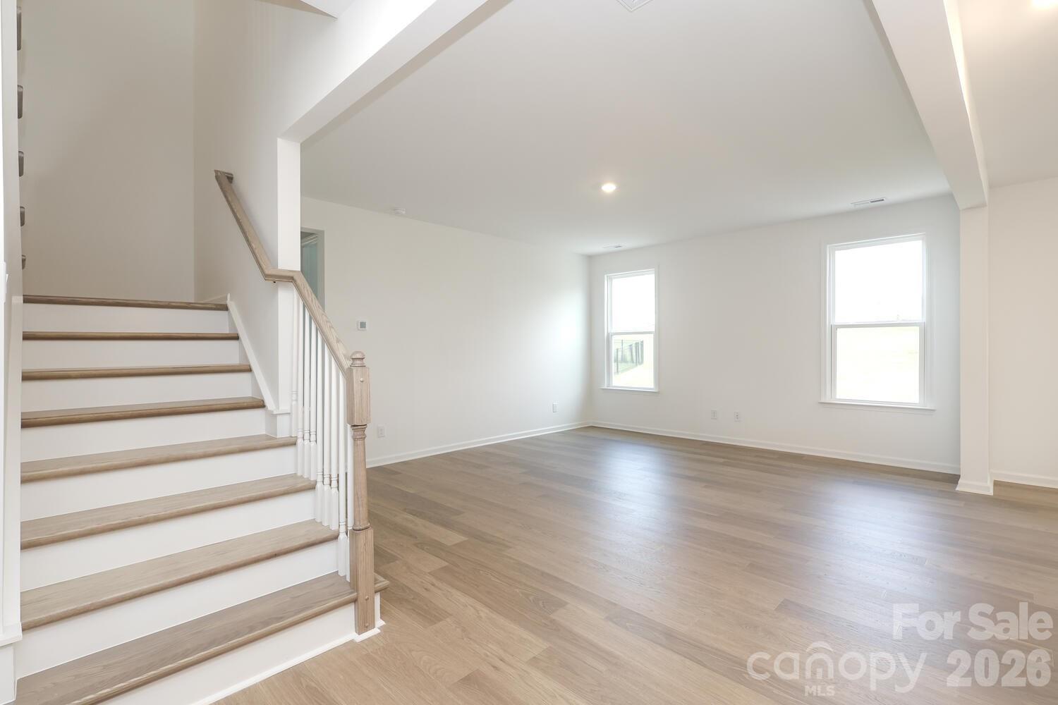 1190 Sugar Crk Road Fort Mill, SC 29707 - Photo 8 of 47 a view of entryway with wooden floor and stairs