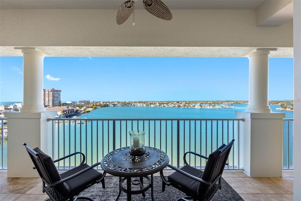 17717 Gulf Boulevard, Unit 702 Redington Shores, FL 33708 - Photo 15 of 99 a view of a chairs in a balcony