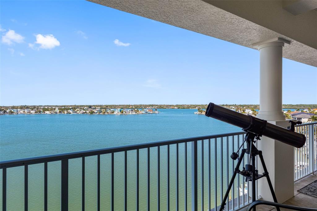 17717 Gulf Boulevard, Unit 702 Redington Shores, FL 33708 - Photo 18 of 99 a balcony with an ocean view