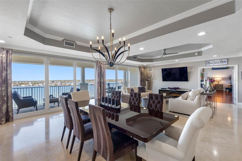 17717 Gulf Boulevard, Unit 702 Redington Shores, FL 33708 - Photo 19 of 99 a view of a dining room with furniture window and outside view