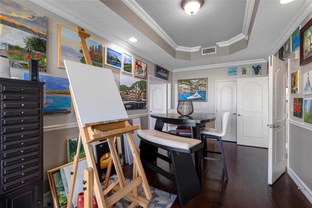 17717 Gulf Boulevard, Unit 702 Redington Shores, FL 33708 - Photo 21 of 99 a living room with furniture and a piano