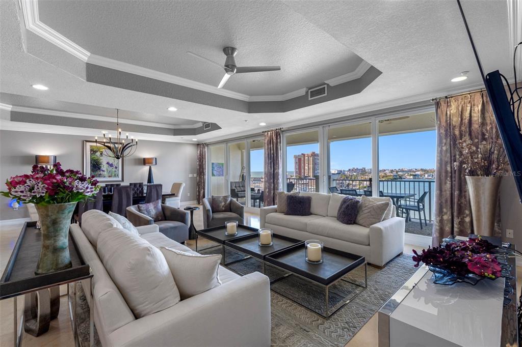 17717 Gulf Boulevard, Unit 702 Redington Shores, FL 33708 - Photo 43 of 99 a living room with furniture and a large window
