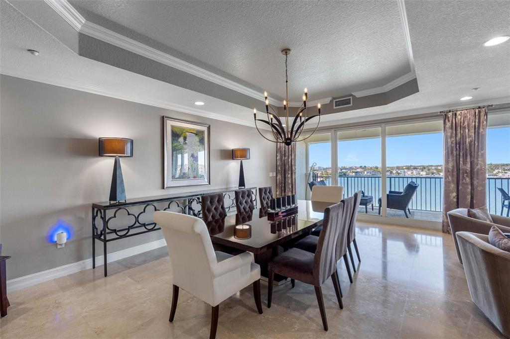 17717 Gulf Boulevard, Unit 702 Redington Shores, FL 33708 - Photo 45 of 99 a view of a dining room with furniture window and outside view