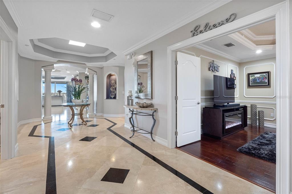 17717 Gulf Boulevard, Unit 702 Redington Shores, FL 33708 - Photo 80 of 99 a living room with stainless steel appliances kitchen island granite countertop furniture and a view of kitchen