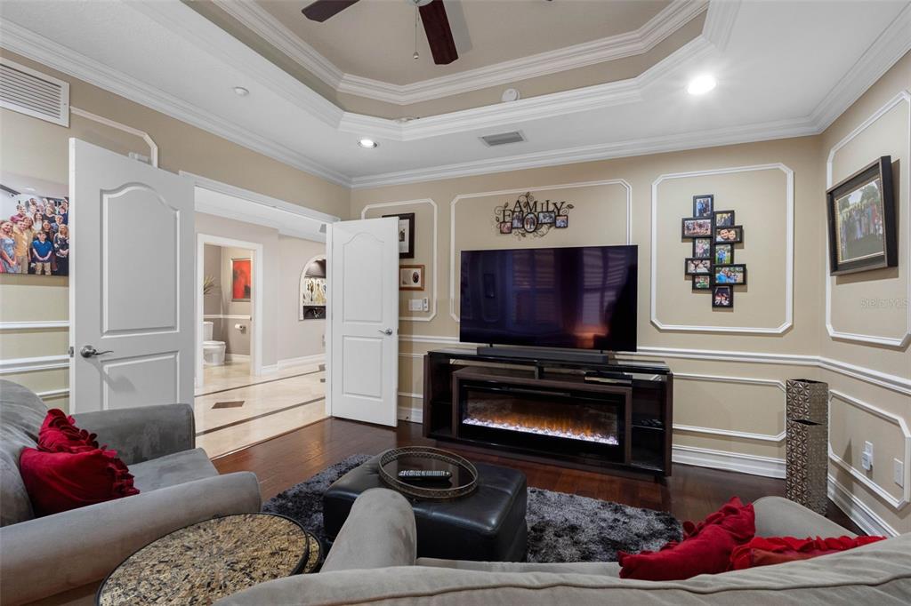 17717 Gulf Boulevard, Unit 702 Redington Shores, FL 33708 - Photo 81 of 99 a living room with furniture and a flat screen tv