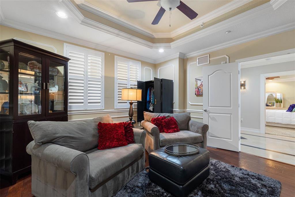 17717 Gulf Boulevard, Unit 702 Redington Shores, FL 33708 - Photo 82 of 99 a living room with furniture and a large window