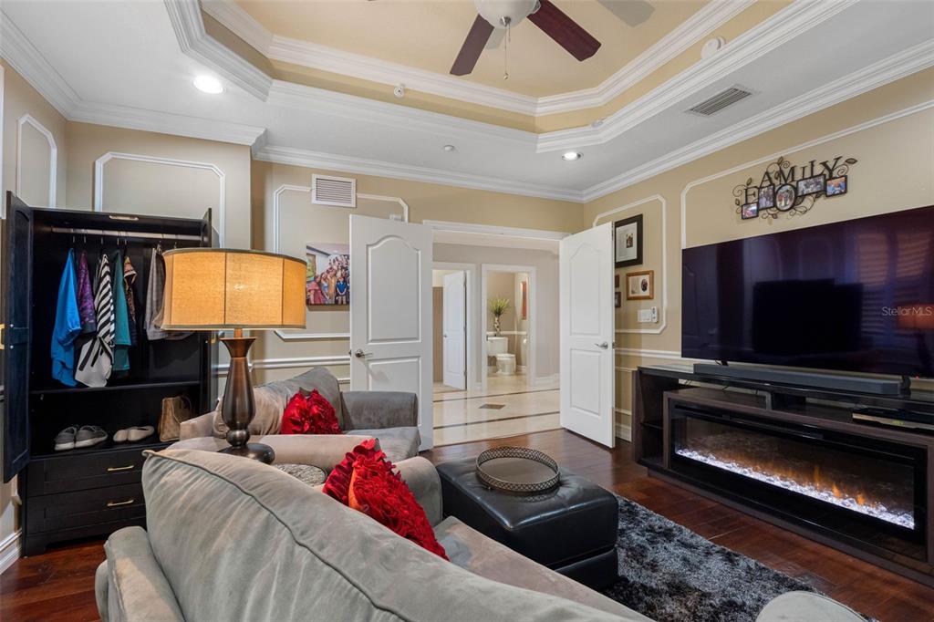17717 Gulf Boulevard, Unit 702 Redington Shores, FL 33708 - Photo 83 of 99 a living room with furniture and a flat screen tv