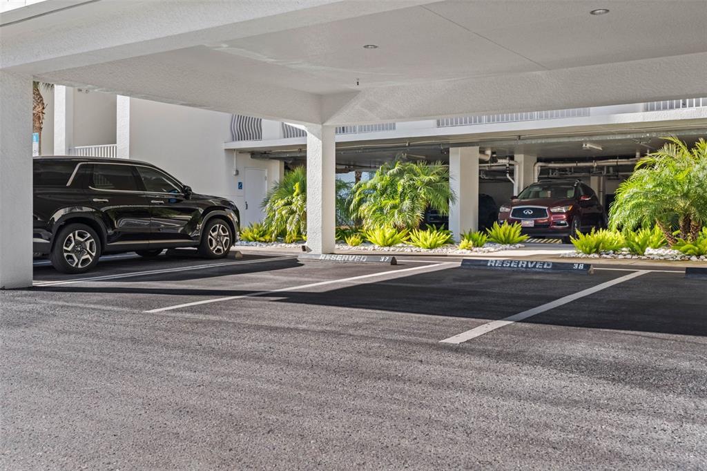 17717 Gulf Boulevard, Unit 702 Redington Shores, FL 33708 - Photo 87 of 99 a view of a car parked in front of a building