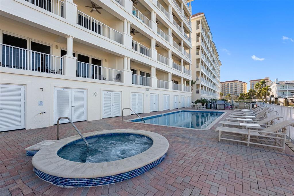 17717 Gulf Boulevard, Unit 702 Redington Shores, FL 33708 - Photo 89 of 99 a view of a patio with a table and chairs