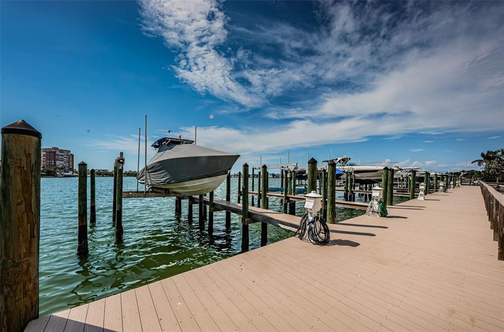 17717 Gulf Boulevard, Unit 702 Redington Shores, FL 33708 - Photo 95 of 99 a view of a terrace with chairs