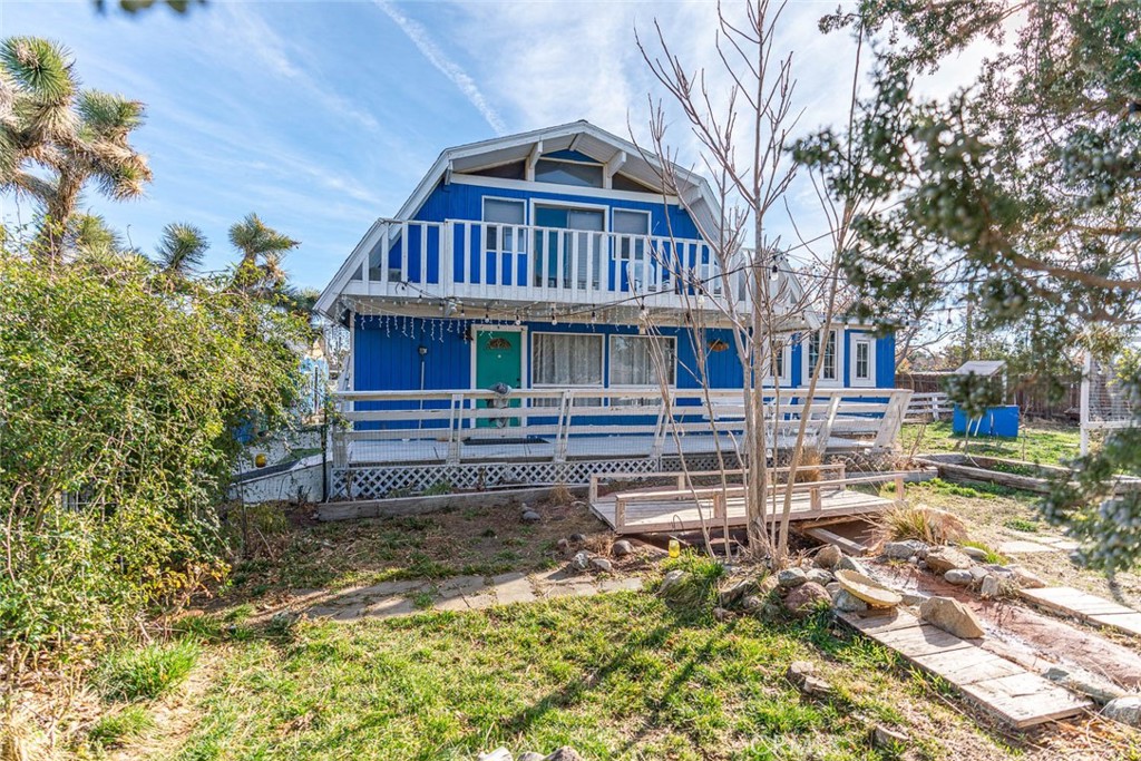 43254 52nd Street West Lancaster, CA 93536 - Photo 11 of 18 a view of front of house with a small yard