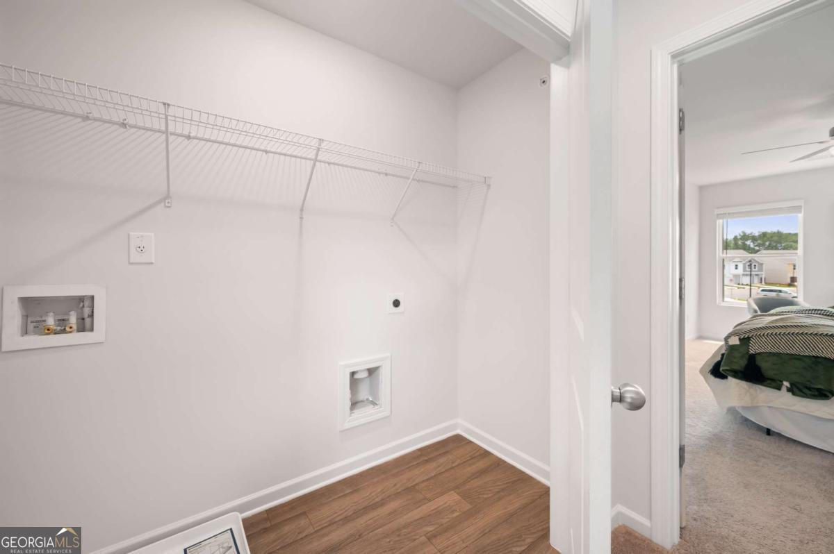 9435 Maple Grove Lane Jonesboro, GA 30238 - Photo 25 of 35 a view of small space with wooden floor