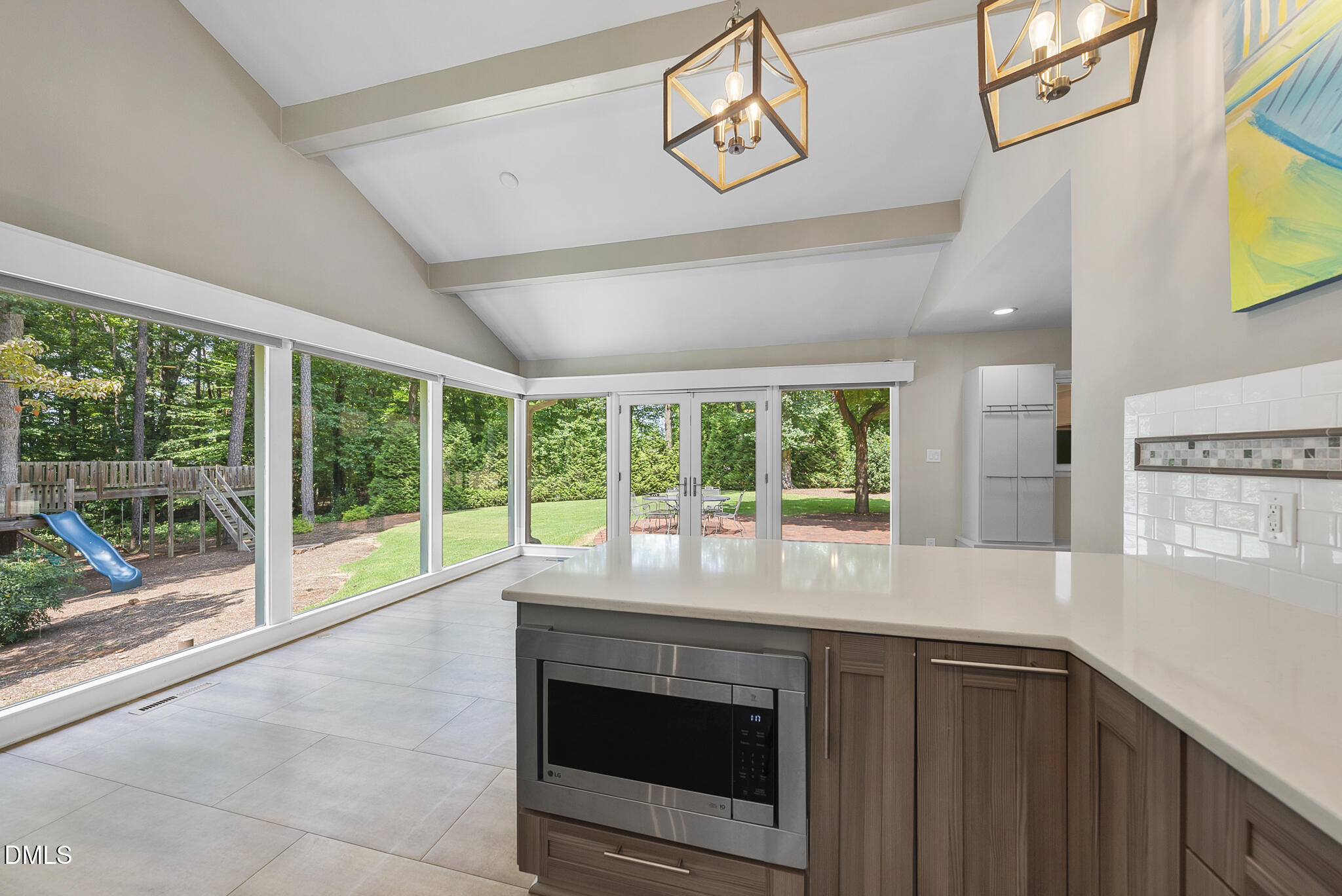 1605 Ridge Road Raleigh, NC 27607 - Photo 16 of 34 a view of a kitchen with a sink and large windows