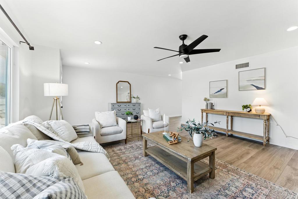 10021 Allenwood Way Santee, CA 92071 - Photo 2 of 28 a living room with furniture and a table