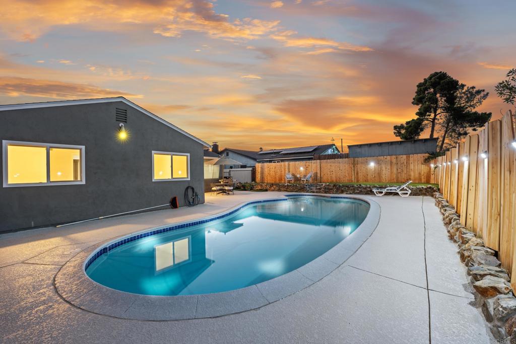 10021 Allenwood Way Santee, CA 92071 - Photo 22 of 28 a view of a swimming pool with a lounge chairs