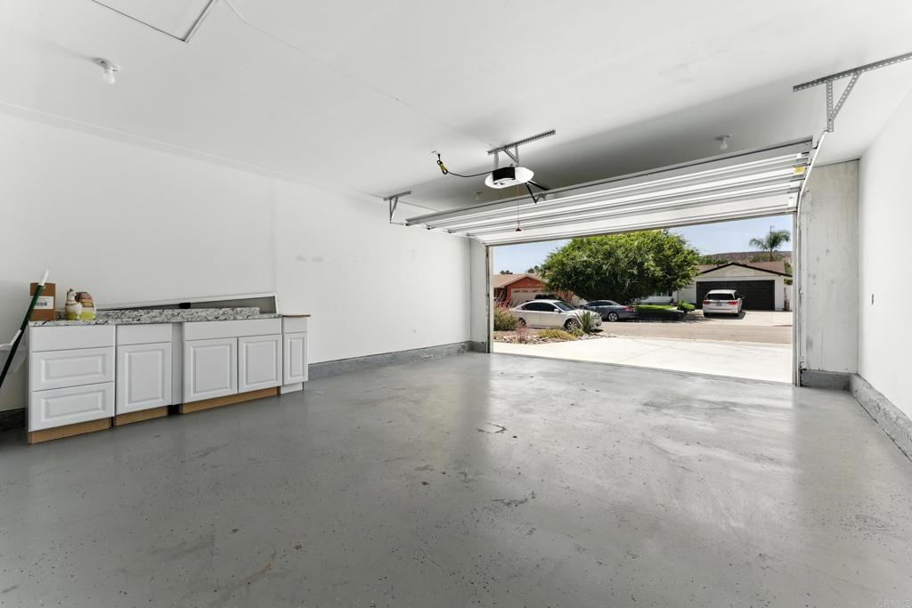 10021 Allenwood Way Santee, CA 92071 - Photo 27 of 28 a view of a livingroom with furniture and a ceiling fan