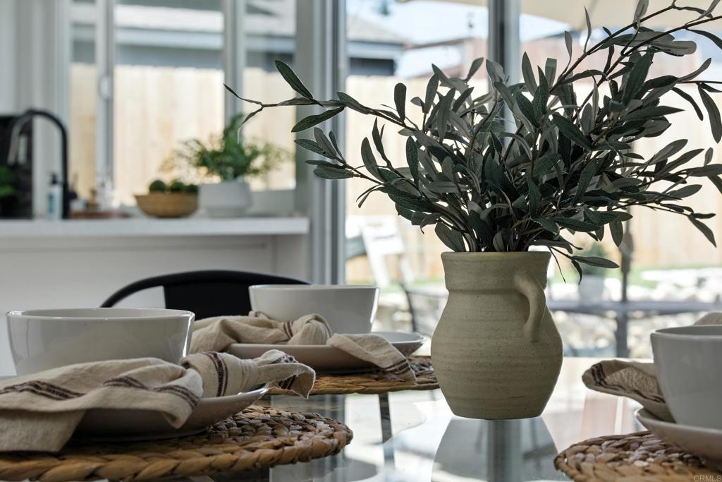 10021 Allenwood Way Santee, CA 92071 - Photo 7 of 28 a living room with furniture and a potted plant