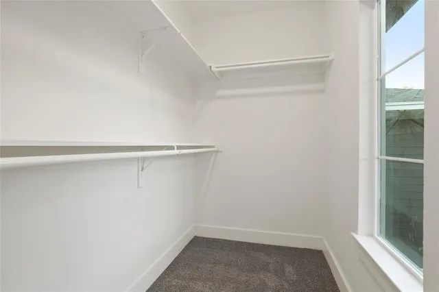 a room with furniture and window