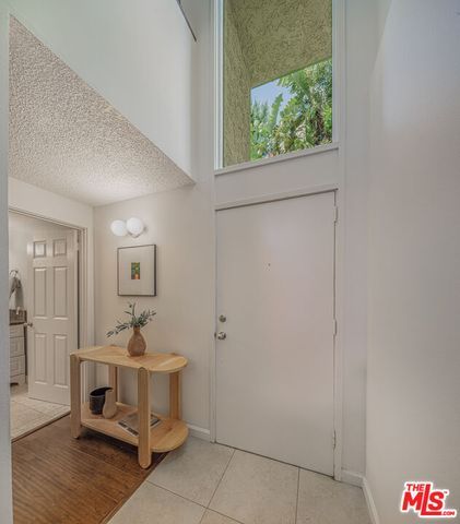 a room that has a bed and a window