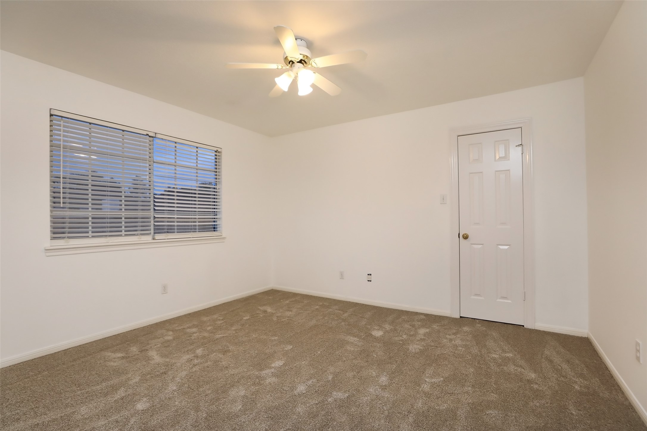 7906 Tizerton Court Spring, TX 77379 - Photo 39 of 50 The third of four bedrooms on the second floor.