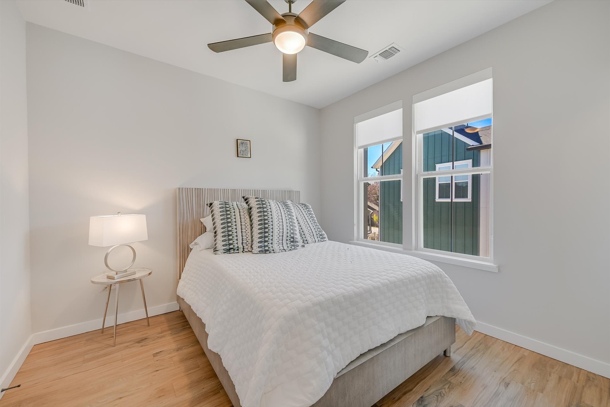 3809 Valley View Road, Unit 7 Austin, TX 78704 - Photo 14 of 21 Bedroom with wood-type flooring and ceiling fan