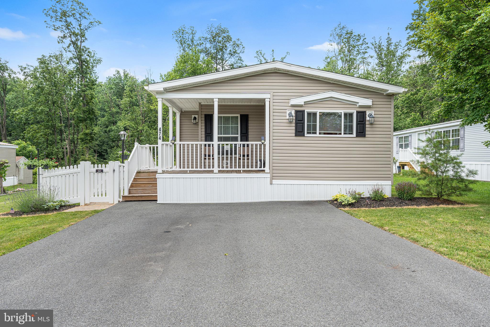 474 Barrington Road Macungie, PA 18062 - Photo 3 of 28 a front view of a house with a yard and garage