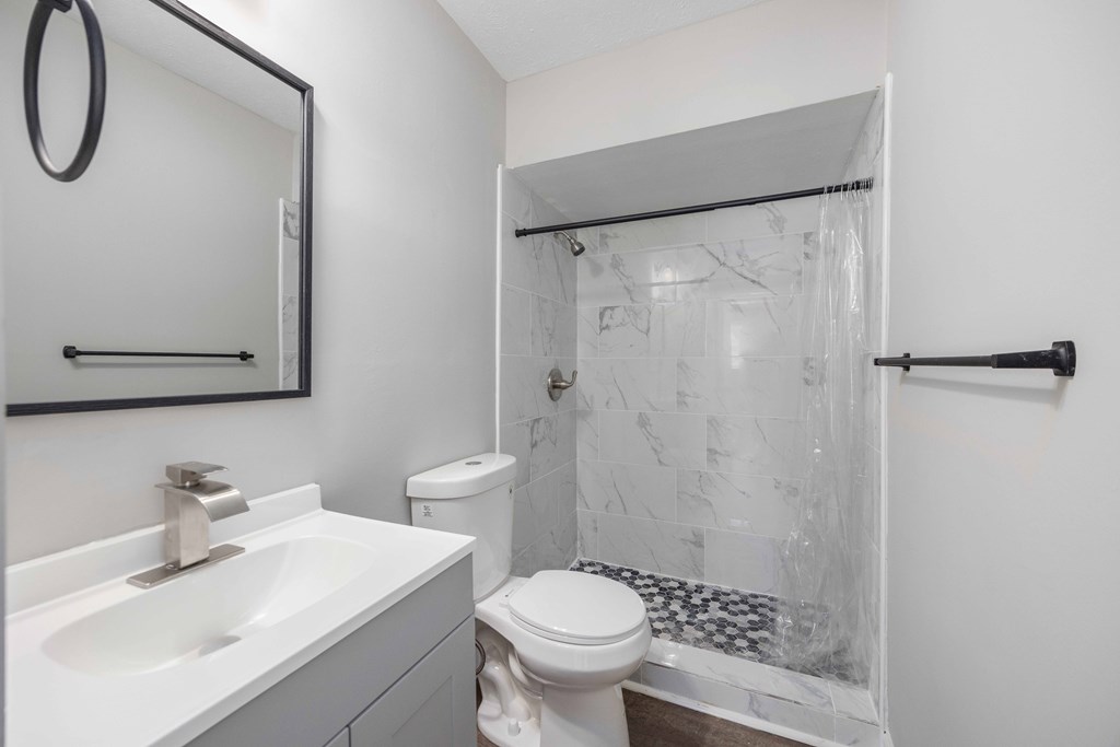 5100 Buckingham Court Columbus, GA 31907 - Photo 18 of 24 a bathroom with a sink toilet and shower