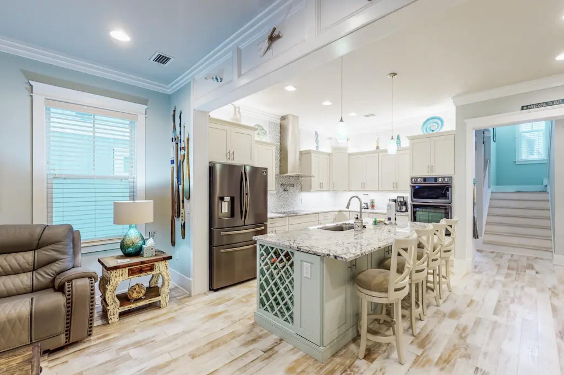 1422 Seaside Circle Navarre, FL 32566 - Photo 3 of 42 a living room with furniture and a table