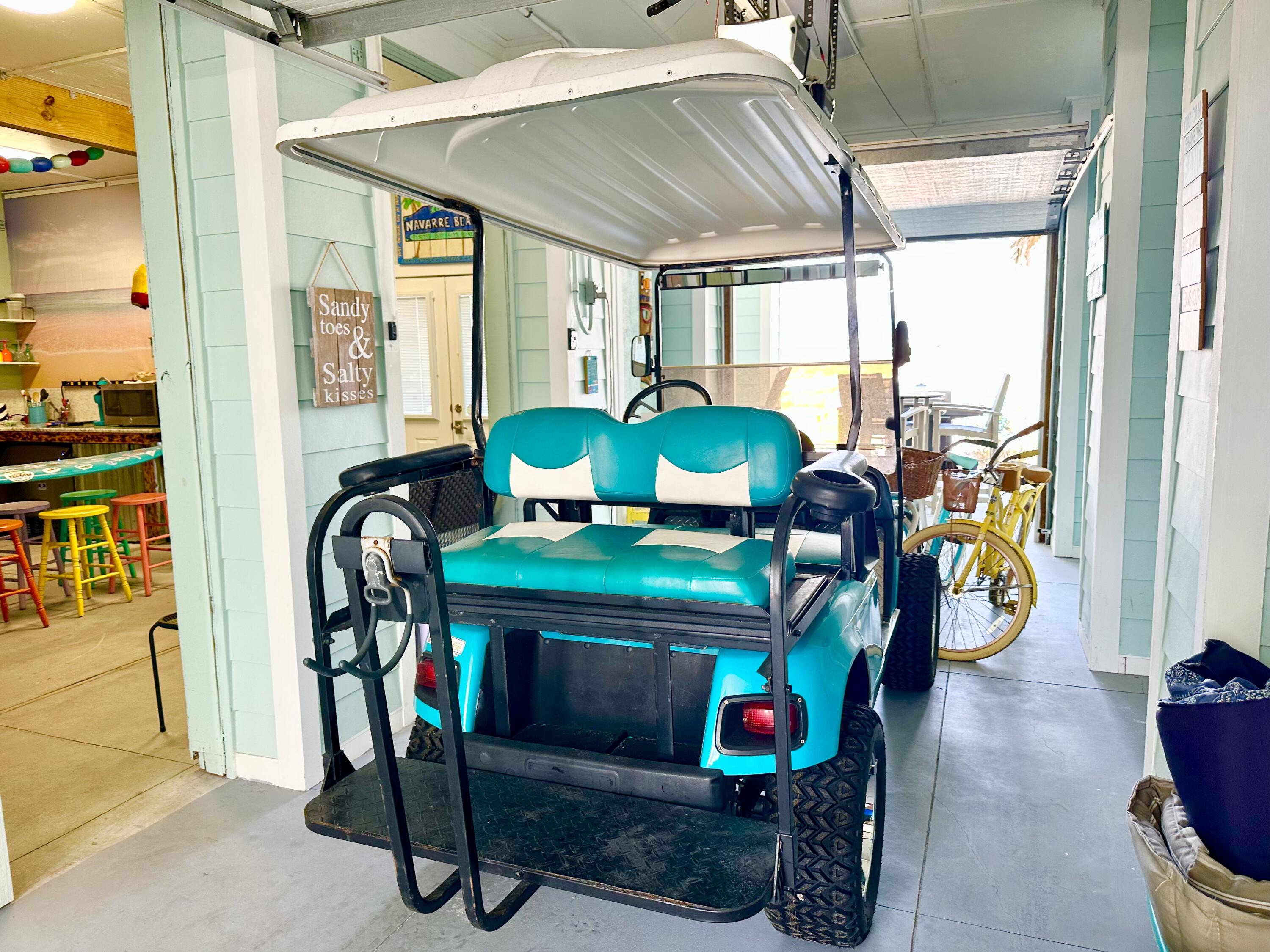 1422 Seaside Circle Navarre, FL 32566 - Photo 32 of 42 a dining room with furniture and floor to ceiling window