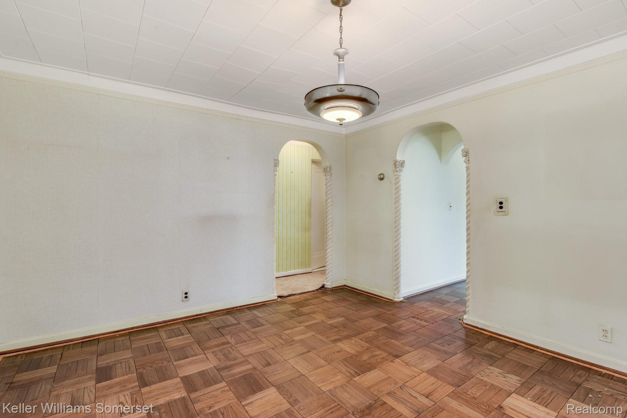 4165 Balfour Road Detroit, MI 48224 - Photo 8 of 27 DINING ROOM WITH ARCHED DOORWAYS