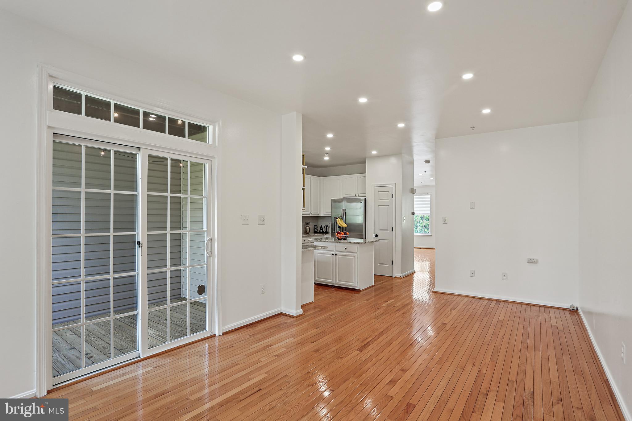 11044 Birchtree Lane, Unit 26 Laurel, MD 20723 - Photo 8 of 37 Family Room leading to Private Deck