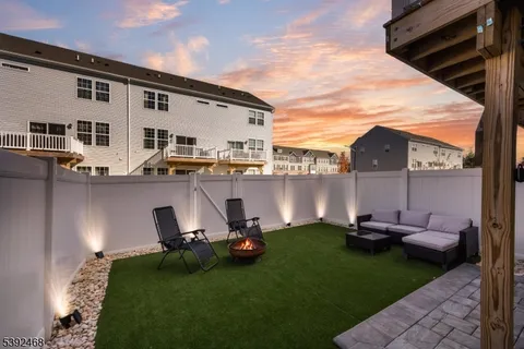 a view of kitchen with furniture and outdoor seating