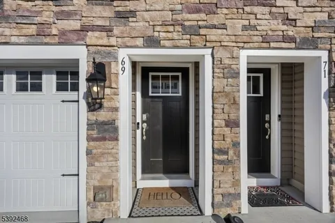 a view of bathroom with a mirror