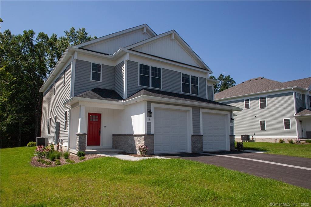 2 Murthas Way Granby, CT 06035 - Photo 27 of 28 a front view of a house with a yard