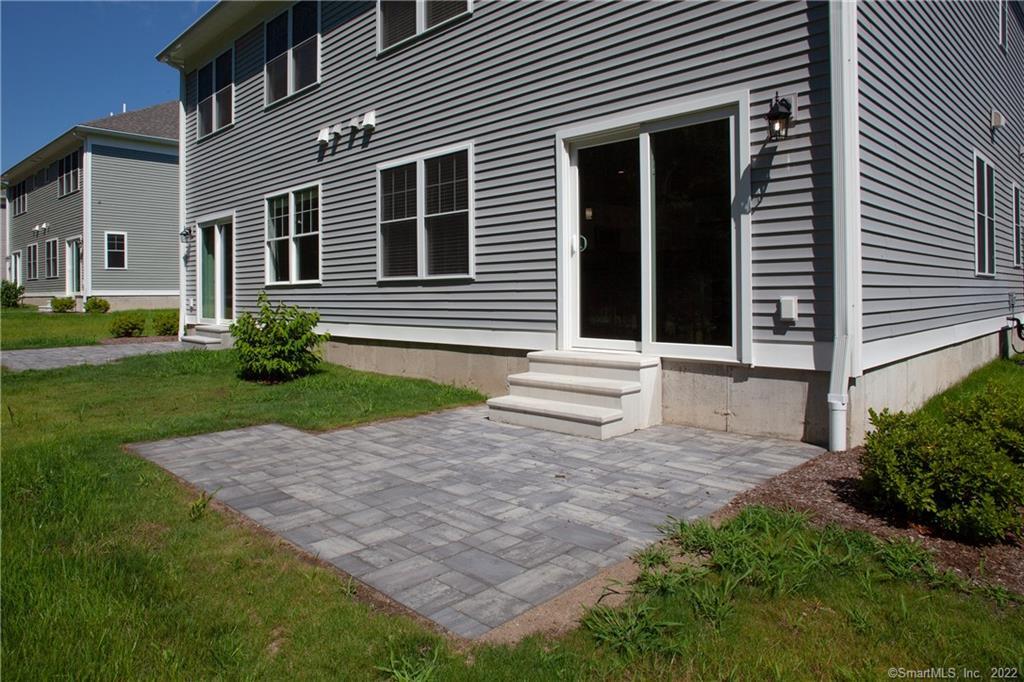 2 Murthas Way Granby, CT 06035 - Photo 28 of 28 a house with garden in front of it