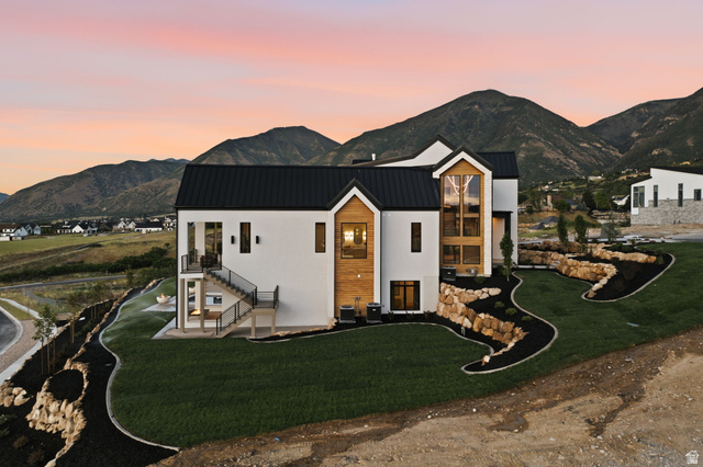923 North Emery Lane Elk Ridge, UT 84651 - Photo 98 of 101 Contemporary white stucco exterior with black metal roofing