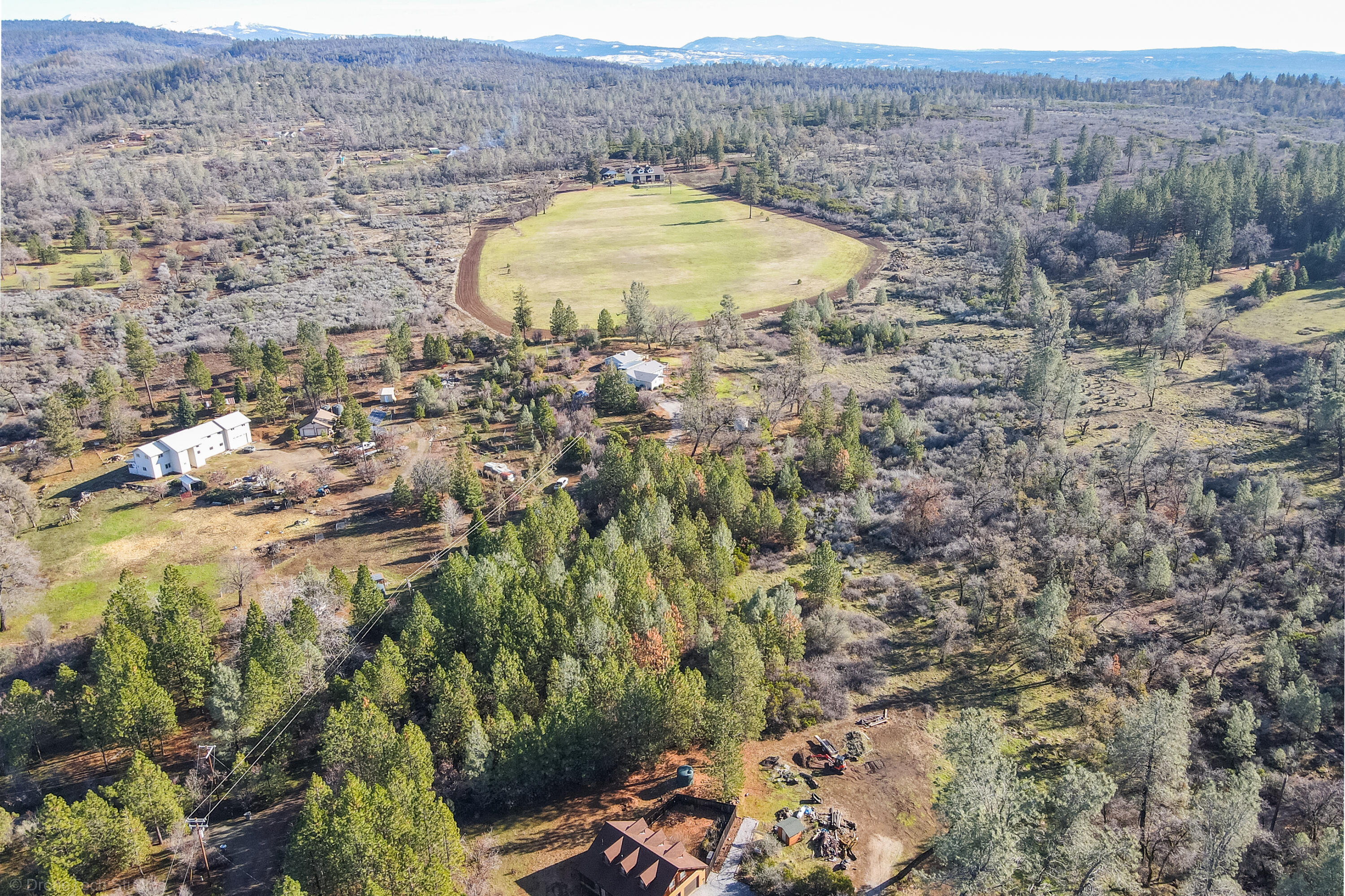 Lot 9 Moraine Way Shingletown, CA 96088 - Photo 11 of 31 a aerial view of a house with a swimming pool and mountain view