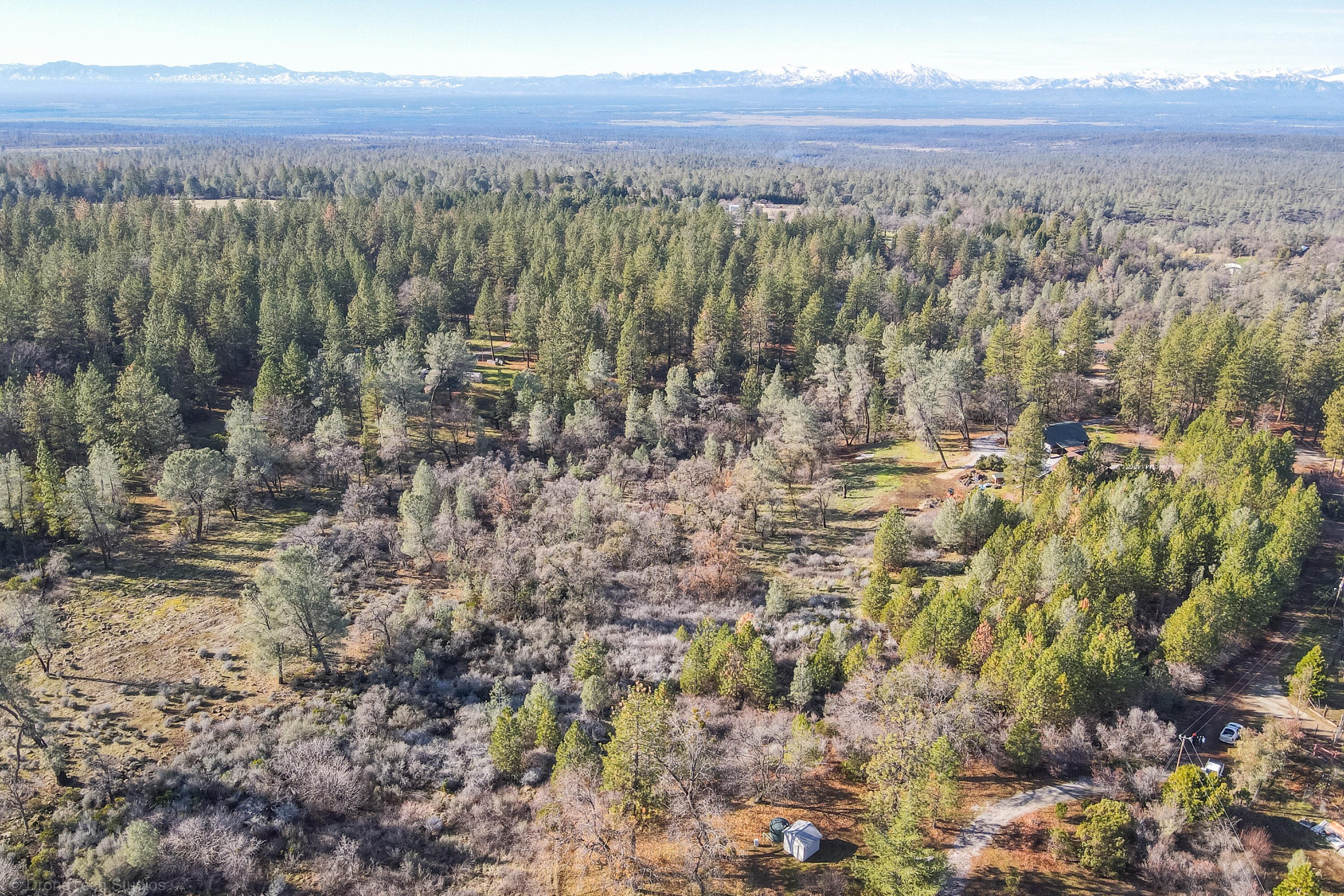Lot 9 Moraine Way Shingletown, CA 96088 - Photo 6 of 31 a view of a city with top of mountains