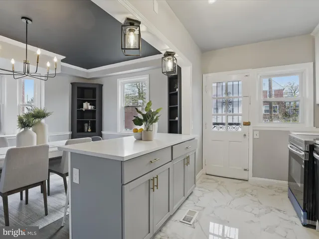 a kitchen with a sink counter top space and appliances