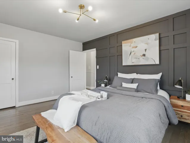 a bedroom with bed and a window