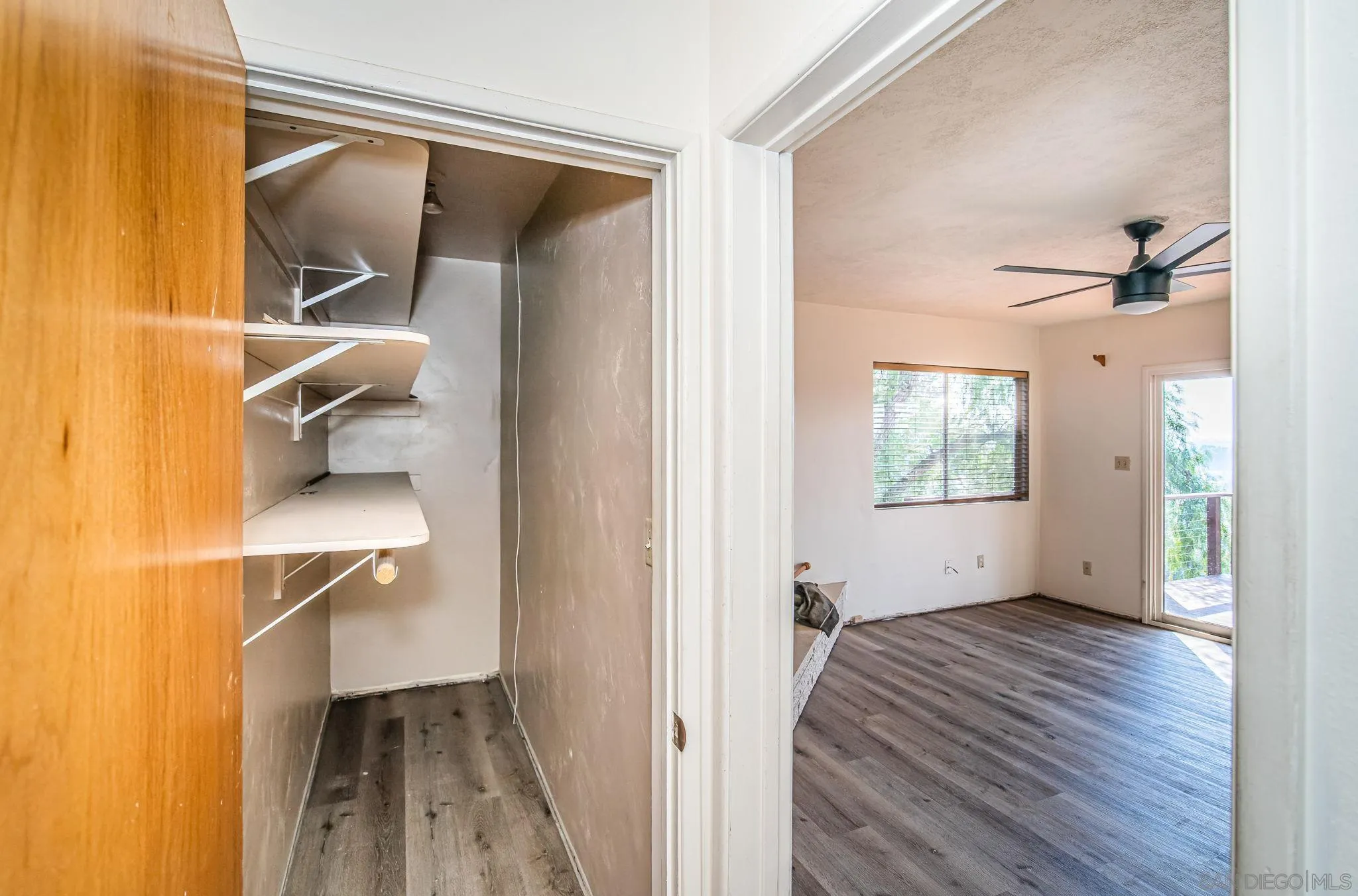 8046 Pasadena Avenue La Mesa, CA 91941 - Photo 20 of 32 a view of hallway with sink and wooden floor